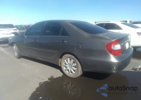 2004 Toyota Camry Le z USA, uszkodzony, nr VIN 4T1BE32K84U869451